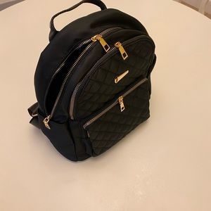 Quilted Metal Detail Functional Backpack